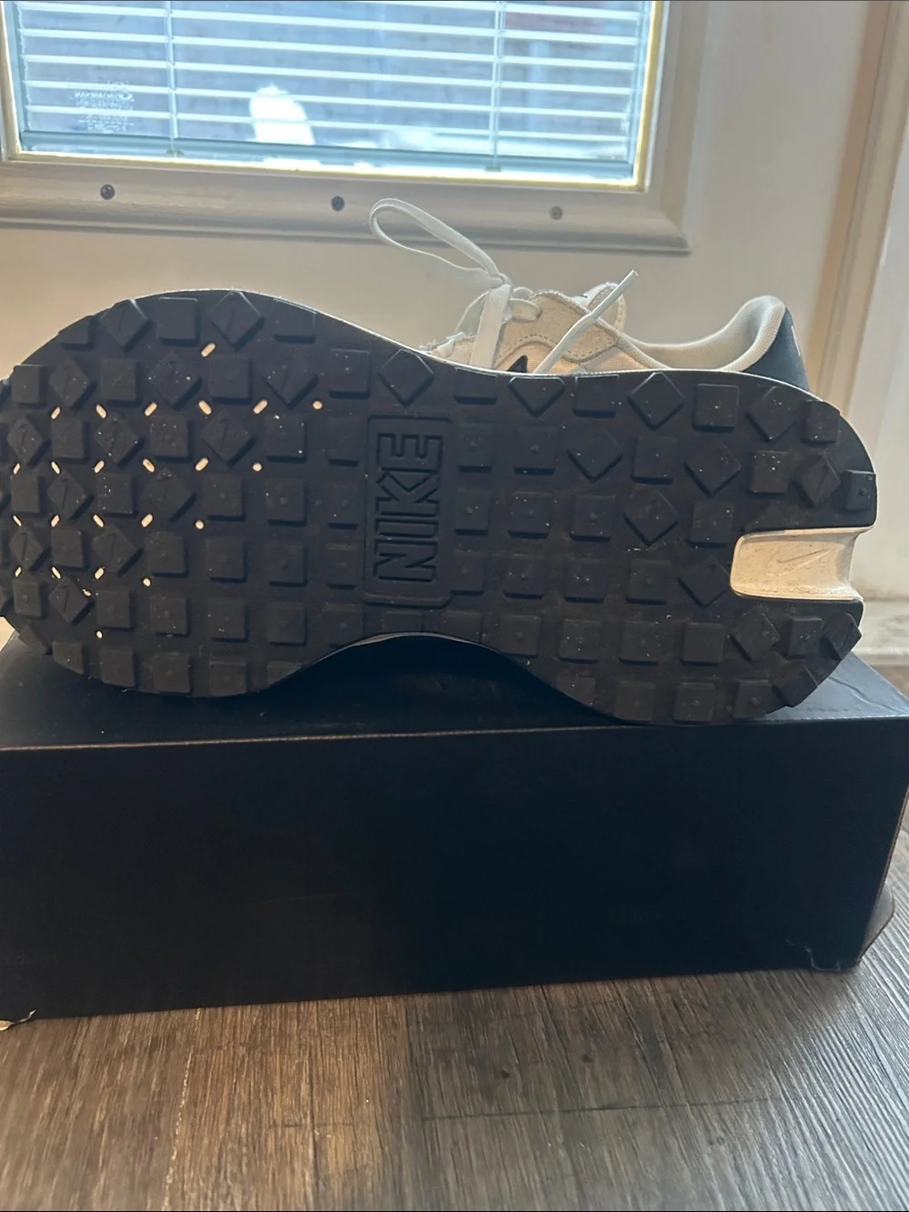Women’s Nike Cream and Black Swoosh Platform Running Sneakers